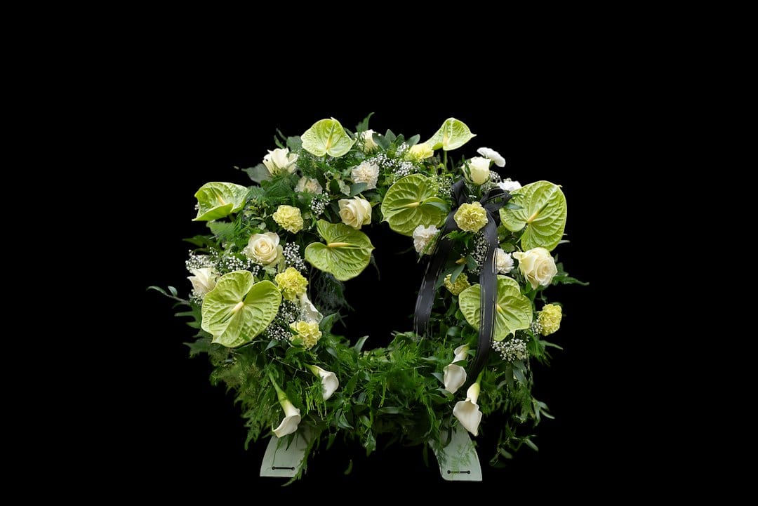 Elegant white floral arrangement for funeral service
