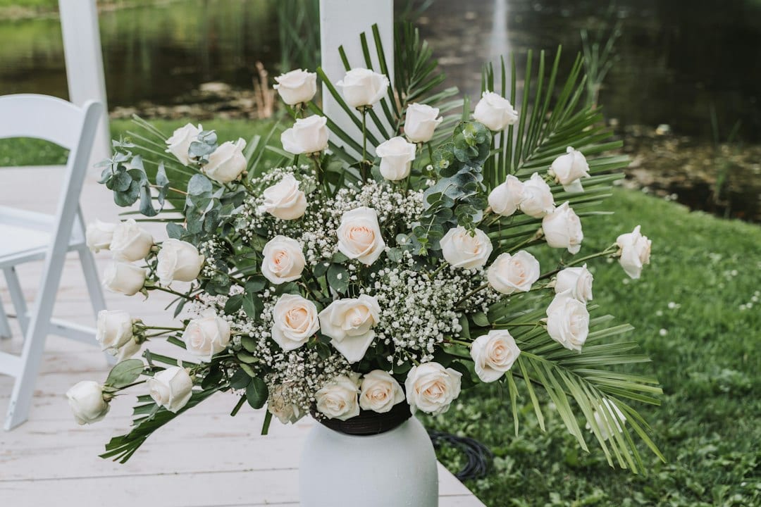 Elegant white roses and lilies floral arrangement